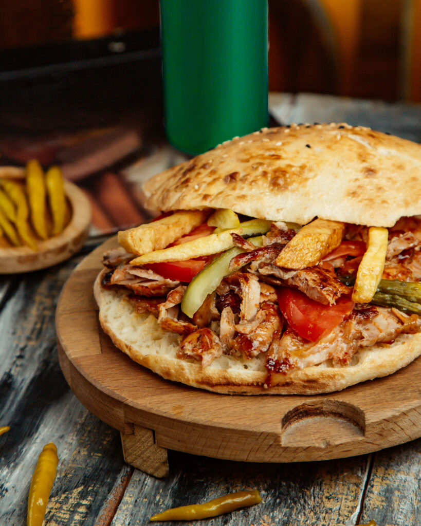 chicken doner with tomato french fries pickled cucumber scaled.jpg